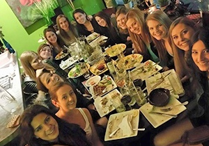 Table filled with Happy Guests